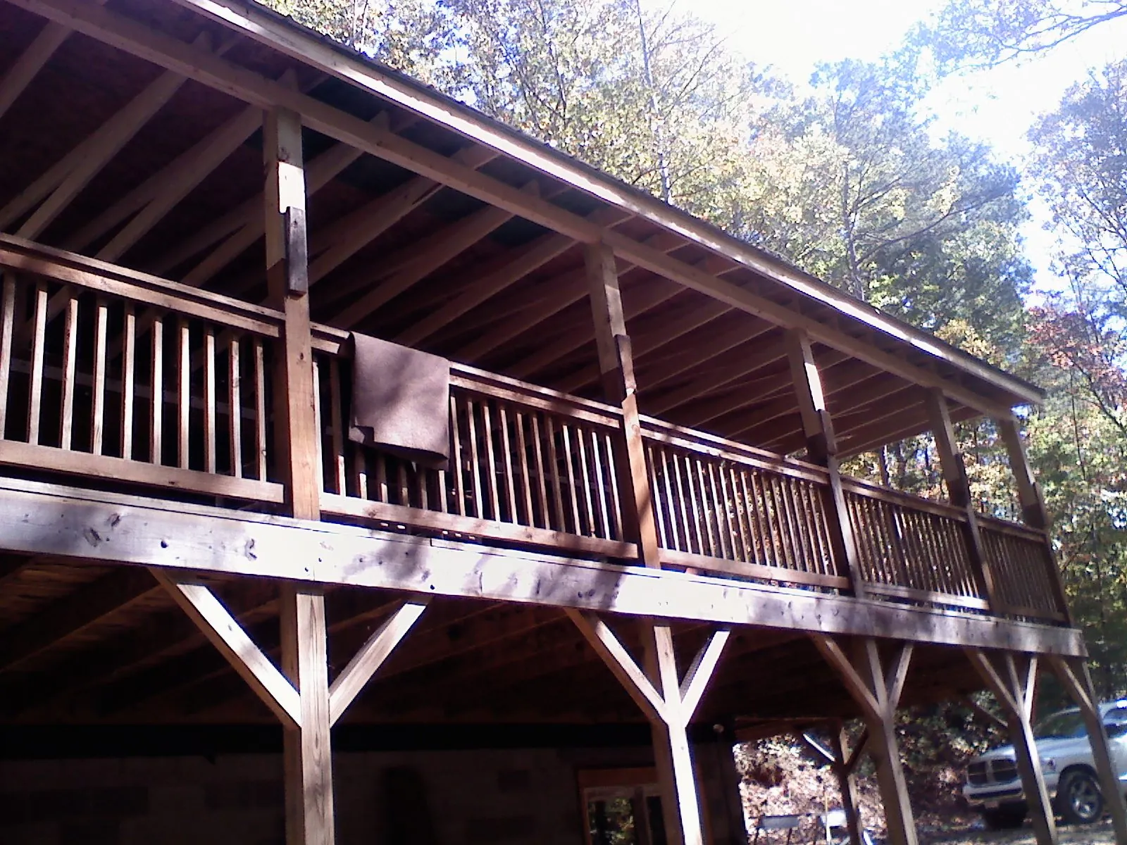 Timber framing under a new elevated porch and deck — Roof Leak Repair in Missouri City by Roofing Brothers